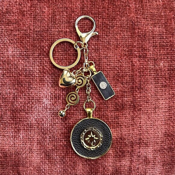 NORTH STAR SWIRLY CIRCLE BAG CHARM Gold Tone✨ - Picture 1 of 6
